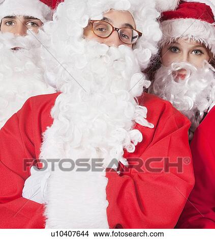 Picture - Portrait of people in Santa costume. Fotosearch