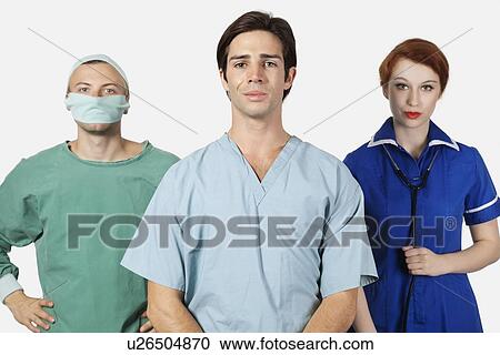 Portrait of three confident medical practitioners against gray background View Large Photo Image Stock Image - Portrait of three confident medical practitioners against gray background. Fotosearch