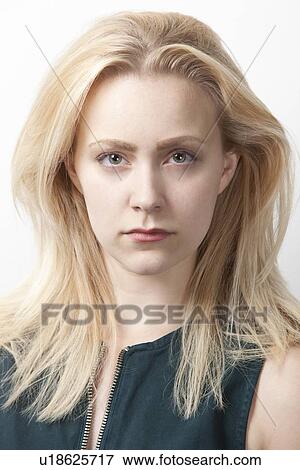 Portrait of young Caucasian woman against white background View Large Photo Image Stock Photo - Portrait of young Caucasian woman against white background. Fotosearch