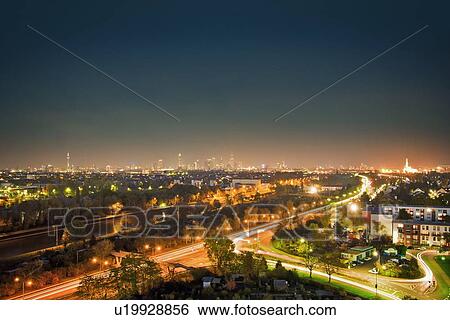 Aerial view of streetlights in city View Large Photo Image Stock Photograph - Aerial view of streetlights in city. Fotosearch