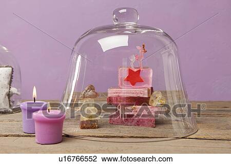 Bars of soap and candles with bell jar View Large Photo Image Stock Image - Bars of soap and candles with bell jar. Fotosearch
