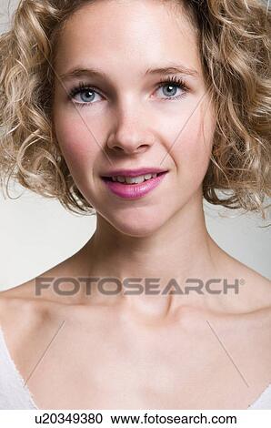 Stock Image - Beauty portrait of a smiling blonde woman. Fotosearch