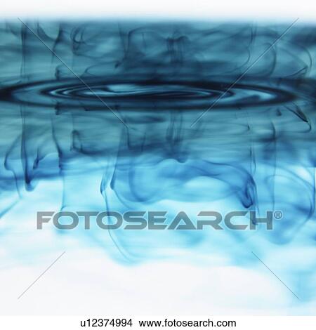 Blue ink swirling in liquid View Large Photo Image Picture - Blue ink swirling in liquid. Fotosearch