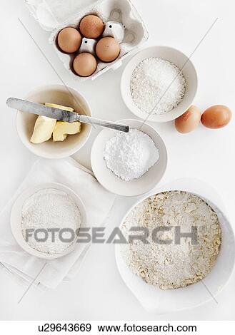 Bowls of sugar, flour, eggs, butter View Large Photo Image Stock Photo - Bowls of sugar, flour, eggs, butter. Fotosearch