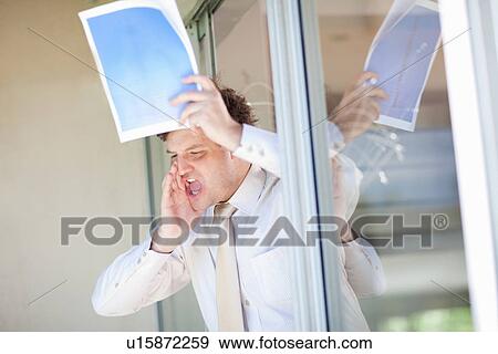 Stock Photo - Businessman shouting from office window. Fotosearch