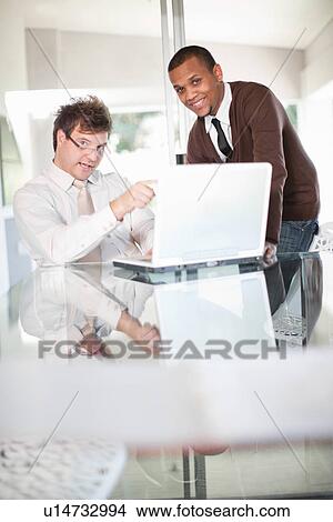 Businessmen talking in meeting View Large Photo Image Picture - Businessmen talking in meeting. Fotosearch