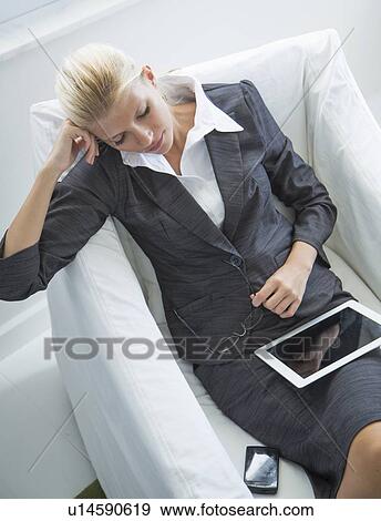 Businesswoman using tablet computer View Large Photo Image Stock Photo - Businesswoman using tablet computer. Fotosearch