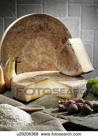Cheese, fruit and grains on table View Large Photo Image Stock Photo - Cheese, fruit and grains on table. Fotosearch