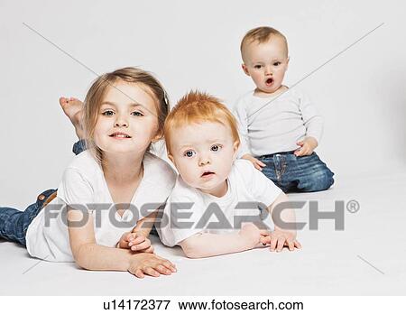 Stock Photo - Children posing together . Fotosearch