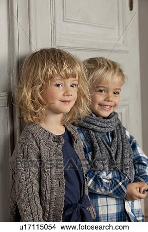 Children smiling together indoors View Large Photo Image Picture - Children smiling together indoors. Fotosearch
