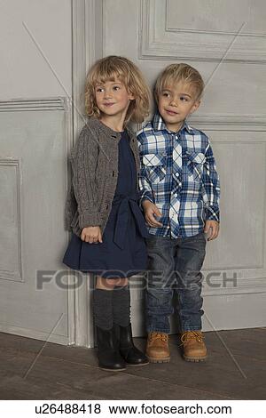 Children smiling together indoors View Large Photo Image Stock Photo - Children smiling together indoors. Fotosearch