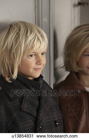 Children wearing winter coats indoors View Large Photo Image Stock Image - Children wearing winter coats indoors. Fotosearch