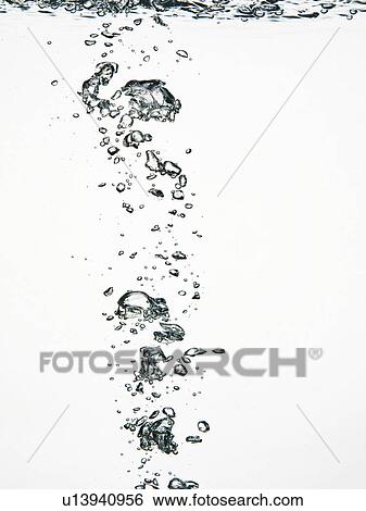 Close up of bubbles in water View Large Photo Image Stock Photograph - Close up of bubbles in water. Fotosearch
