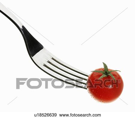 Close up of cherry tomato on fork View Large Photo Image Stock Photo - Close up of cherry tomato on fork. Fotosearch