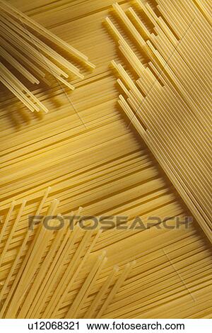Close up of dry spaghetti noodles View Large Photo Image Stock Image - Close up of dry spaghetti noodles. Fotosearch