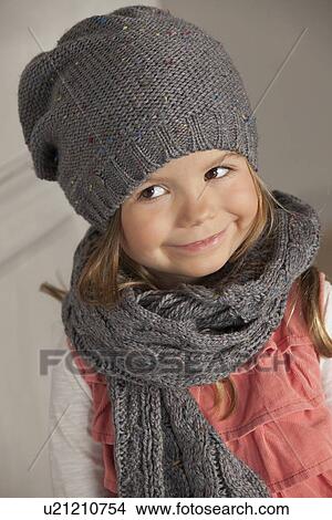 Picture - Close up of girls smiling face. Fotosearch