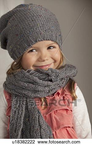 Stock Image - Close up of girls smiling face. Fotosearch