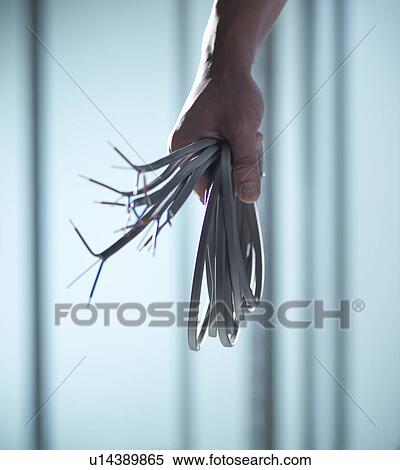 Close up of hand holding cords View Large Photo Image Stock Photography - Close up of hand holding cords. Fotosearch