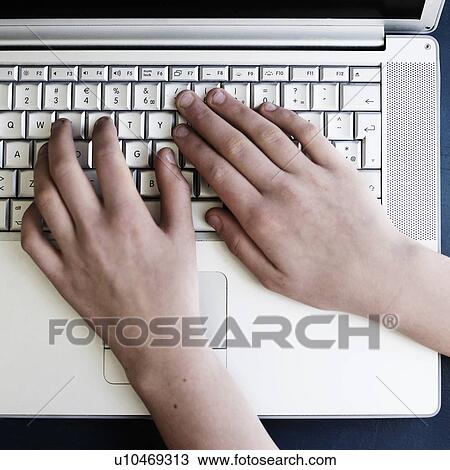 Close up of hands using laptop View Large Photo Image Stock Image - Close up of hands using laptop. Fotosearch