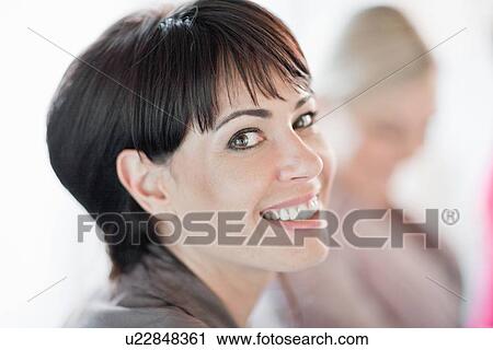 Close up of womans smiling face View Large Photo Image Stock Image - Close up of womans smiling face. Fotosearch