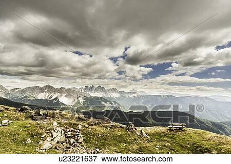Clouds over grassy rural landscape View Large Photo Image Stock Photo - Clouds over grassy rural landscape. Fotosearch