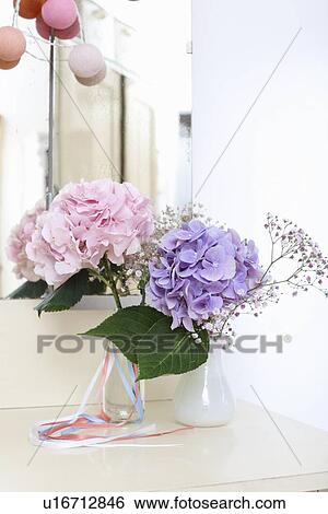 Colorful flowers in glass vase View Large Photo Image Stock Photograph - Colorful flowers in glass vase. Fotosearch
