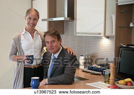 Couple having coffee together View Large Photo Image Stock Image - Couple having coffee together. Fotosearch