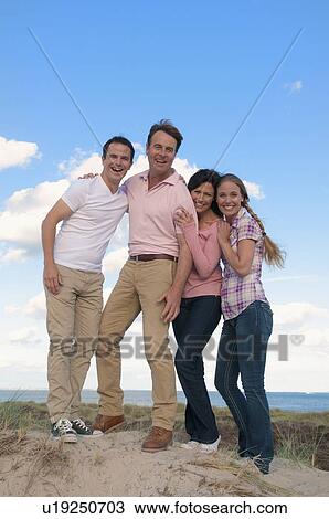 Couple smiling together outdoors View Large Photo Image Stock Image - Couple smiling together outdoors. Fotosearch