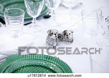 Picture - Dog figurines on table. Fotosearch