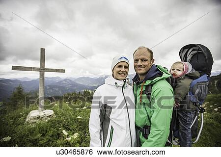 Family hiking together outdoors View Large Photo Image Stock Photograph - Family hiking together outdoors. Fotosearch