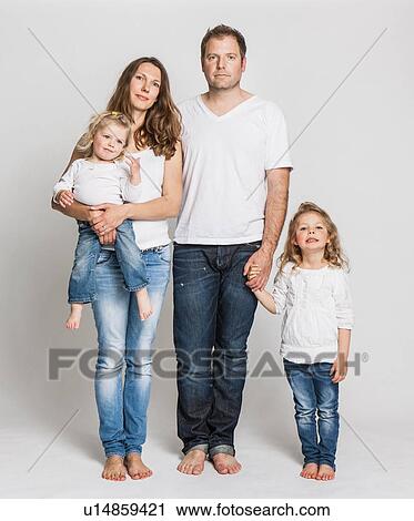 Family posing together View Large Photo Image Stock Image - Family posing together . Fotosearch
