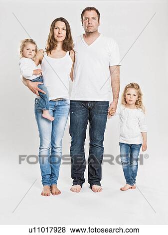 Family posing together View Large Photo Image Stock Photo - Family posing together . Fotosearch