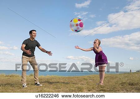 Father and daughter playing together View Large Photo Image Stock Photograph - Father and daughter playing together. Fotosearch