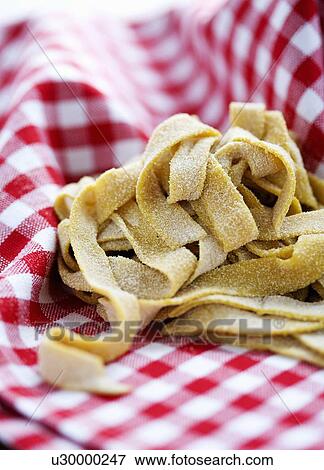 Fresh pasta in cloth View Large Photo Image Stock Photo - Fresh pasta in cloth. Fotosearch