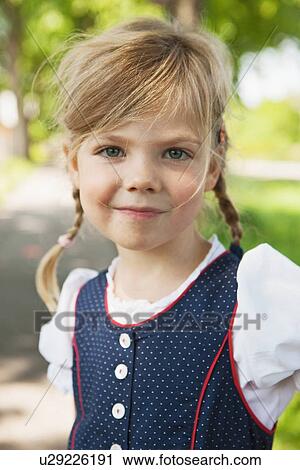 Girl in traditional Bavarian clothes View Large Photo Image Stock Image - Girl in traditional Bavarian clothes. Fotosearch