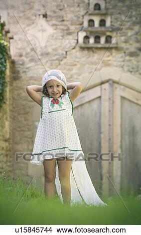 Girl playing with veil in garden View Large Photo Image Picture - Girl playing with veil in garden. Fotosearch