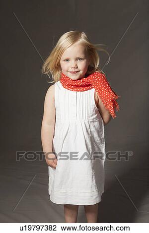 Girl smiling in studio View Large Photo Image Stock Image - Girl smiling in studio. Fotosearch