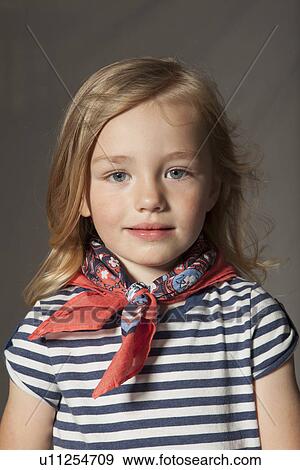Stock Photo - Girl wearing silk scarf in studio. Fotosearch