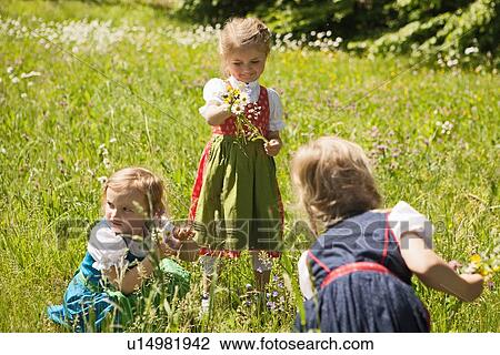 Girls in traditional Bavarian clothes View Large Photo Image Stock Image - Girls in traditional Bavarian clothes. Fotosearch