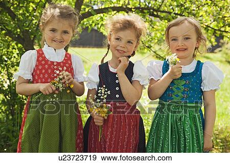 Girls in traditional Bavarian clothes View Large Photo Image Stock Photo - Girls in traditional Bavarian clothes. Fotosearch