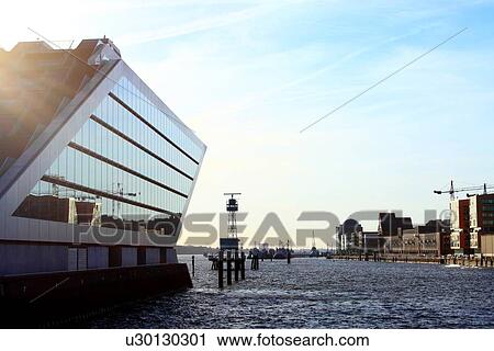 Glass building overlooking urban harbor View Large Photo Image Stock Image - Glass building overlooking urban harbor. Fotosearch