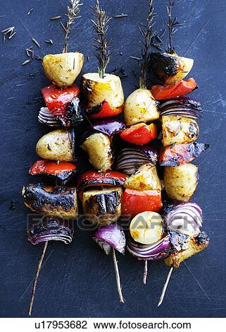 Stock Image - Grilled vegetable rosemary kebabs. Fotosearch
