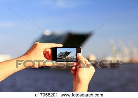 Hands taking picture with cell phone View Large Photo Image Stock Image - Hands taking picture with cell phone. Fotosearch