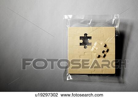 Jigsaw puzzle shrink wrapped in plastic View Large Photo Image Stock Image - Jigsaw puzzle shrink wrapped in plastic. Fotosearch
