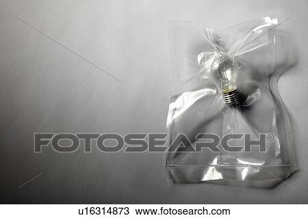 Light bulb shrink wrapped in plastic View Large Photo Image Stock Image - Light bulb shrink wrapped in plastic. Fotosearch