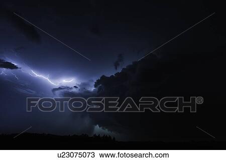 Lighting clouds over rural landscape View Large Photo Image Stock Image - Lighting clouds over rural landscape. Fotosearch