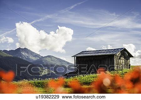 Log cabin in rural landscape View Large Photo Image Stock Photo - Log cabin in rural landscape. Fotosearch