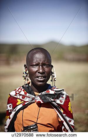 Stock Photo - Maasai woman standing outdoors. Fotosearch