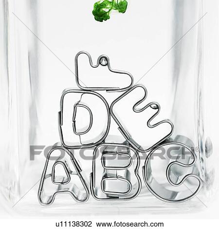 Metal letter shapes stacked together View Large Photo Image Stock Image - Metal letter shapes stacked together. Fotosearch