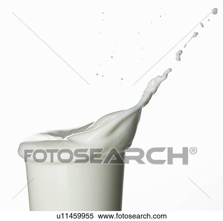 Milk splashing into glass View Large Photo Image Stock Photography - Milk splashing into glass. Fotosearch